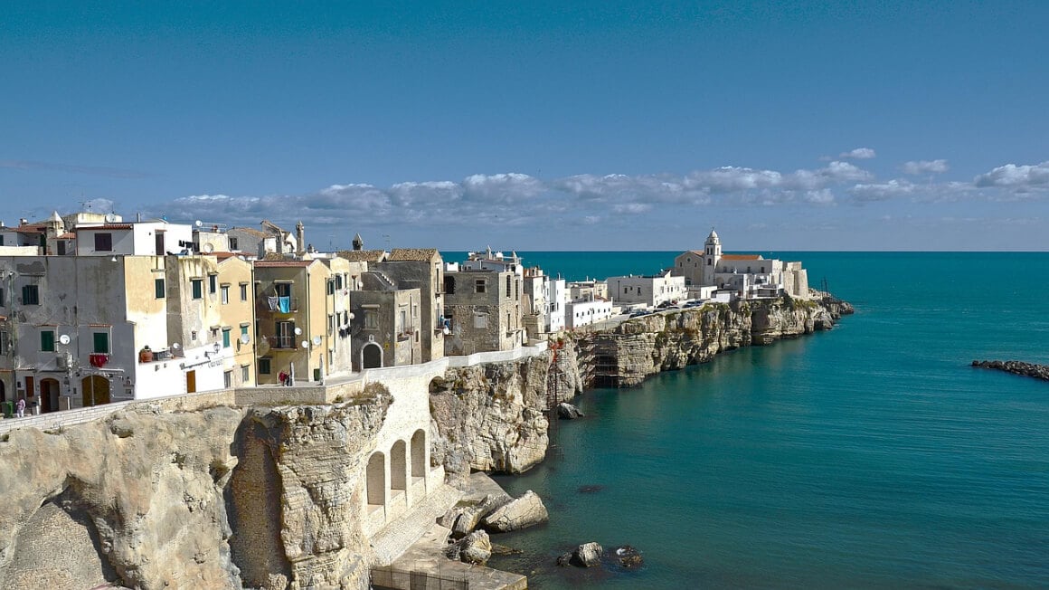 houses built along a limestone sea walk in Foggia Puglia Italy