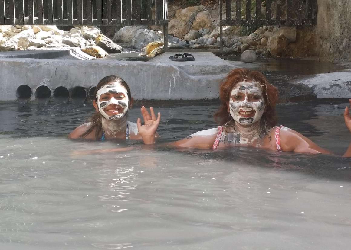 st lucia diamond mineral and mud baths plus waterfall adventure, two people relaxing in mud baths