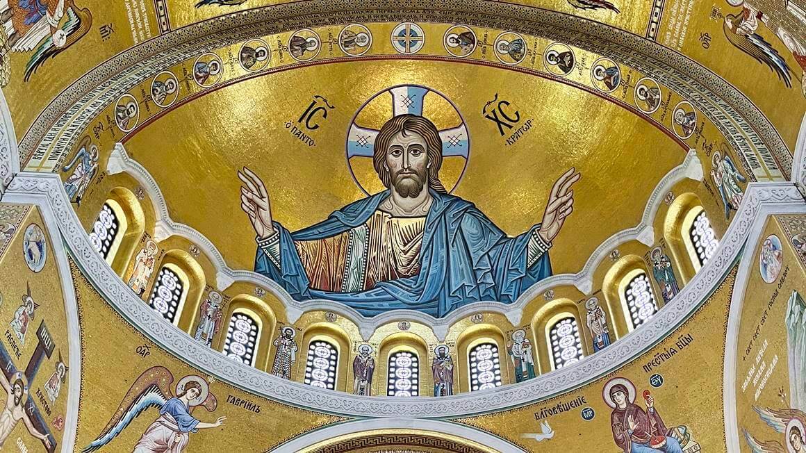 a painting of Christ the Pantocrator, on the ceiling of St Sava Church