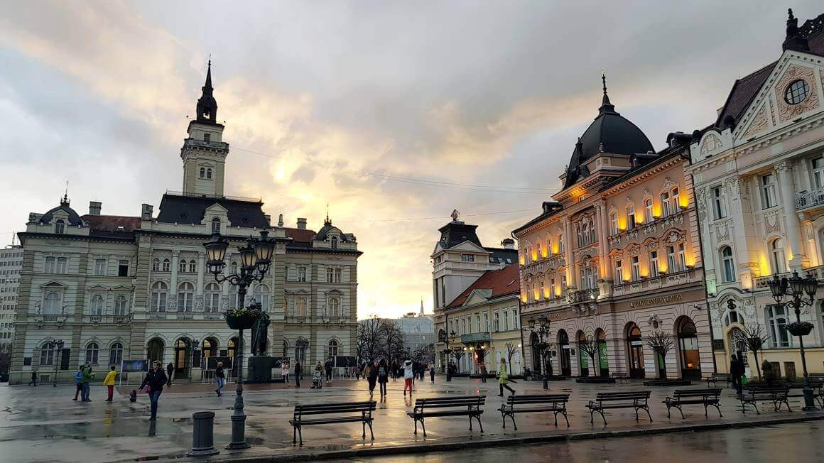 people walking around The Liberty Square around sunset, Novi Sad
