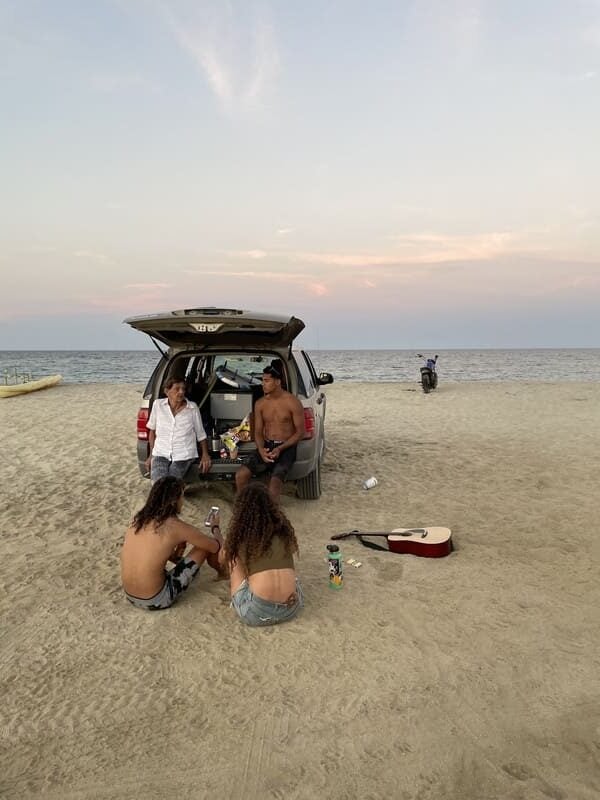mexico baja van life sunset friends chilling beach