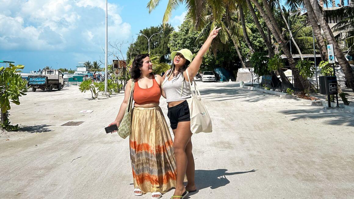 female travellers having fun at the beach