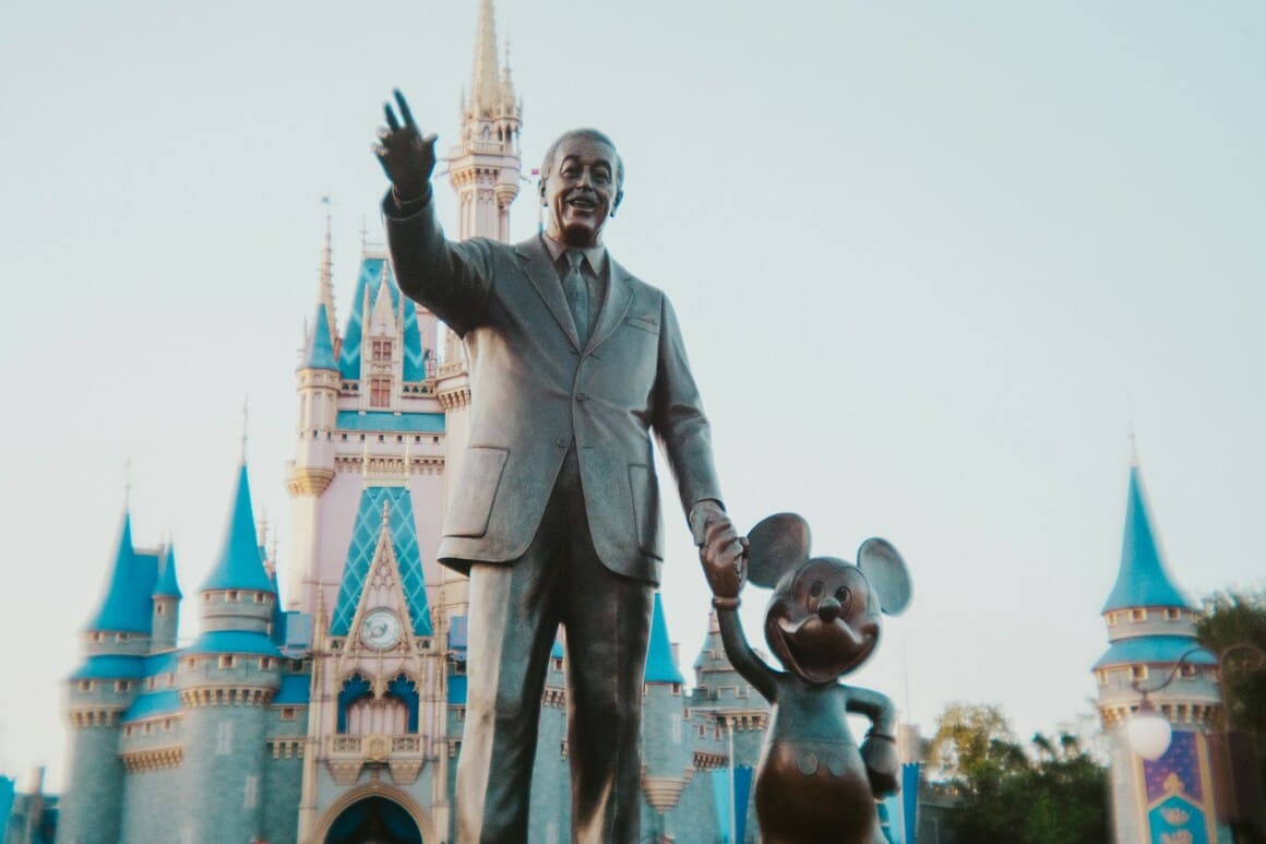 walt disney and mickey mouse statue