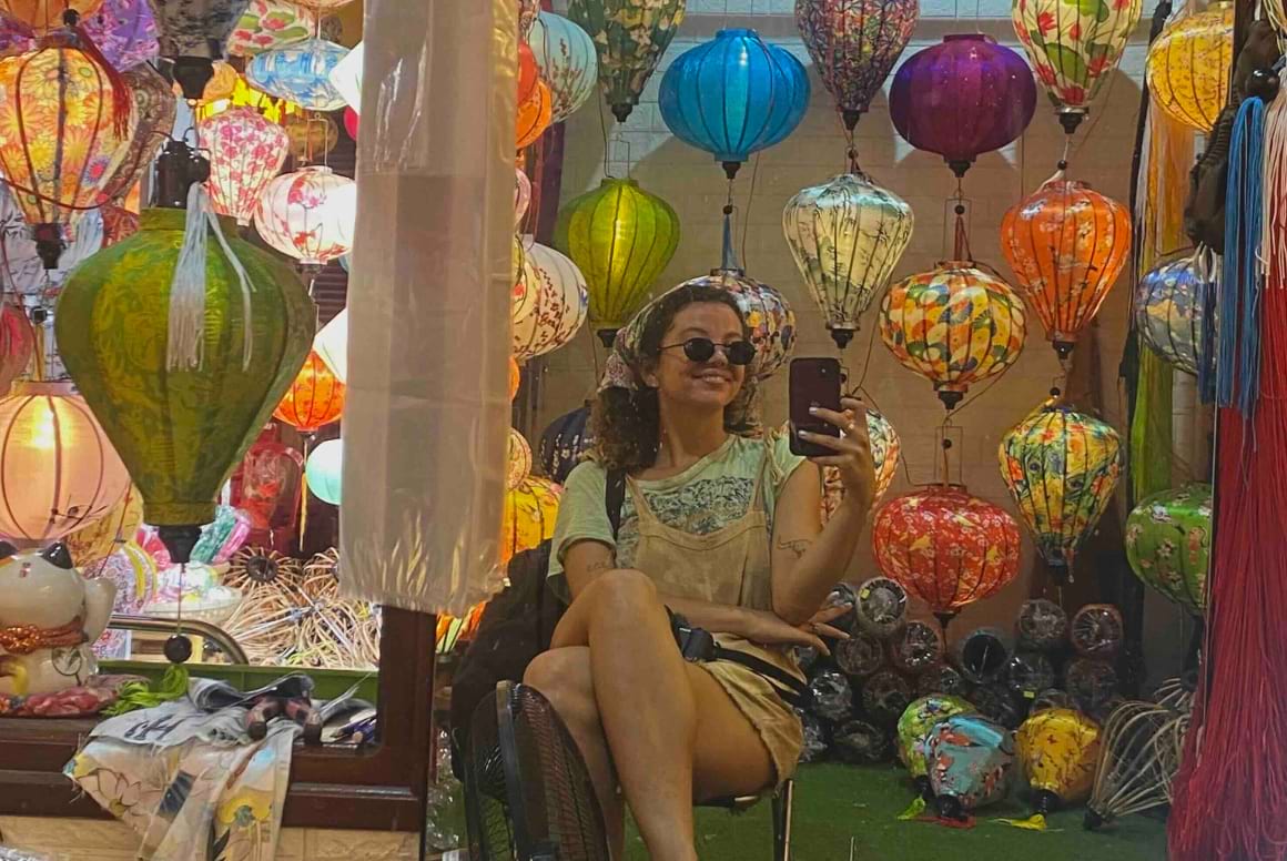 girl posing with lanterns in da nang, vietnam