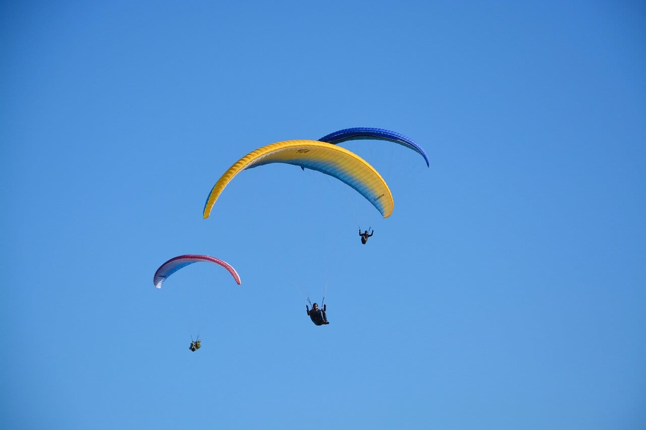 Soar Over Satpara Lake on a Paraglider Tour