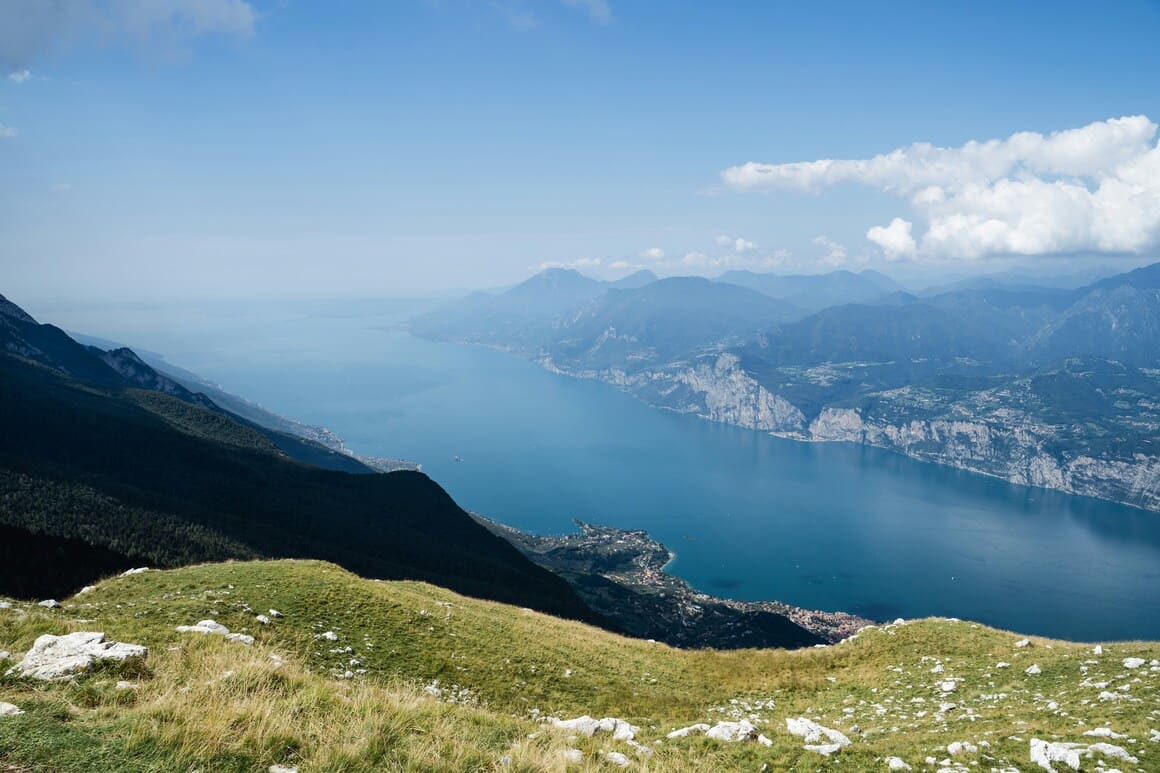View from an alpine hill on Monte Baldo in Italy looking at Lake Garda