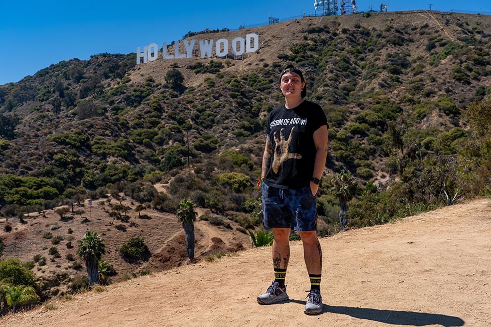 Nic standing in front of the Hollywood sign in LA, United States of America