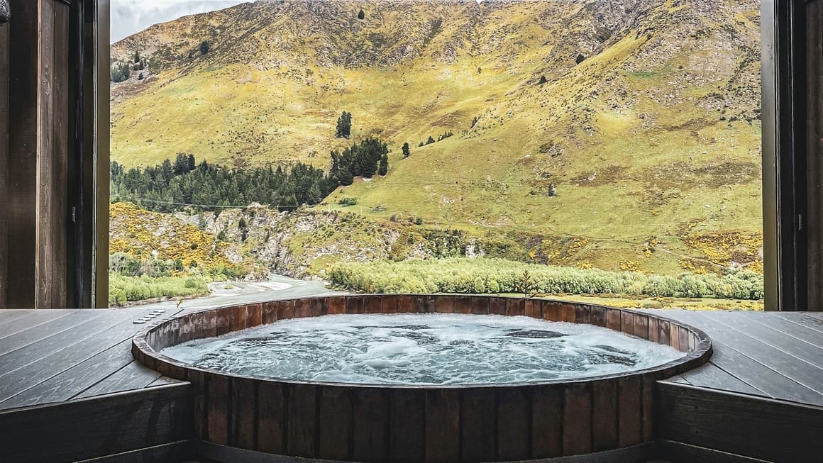 Views to the mountains at the Onsen hot pools Queenstown, Aotearoa, New Zealand