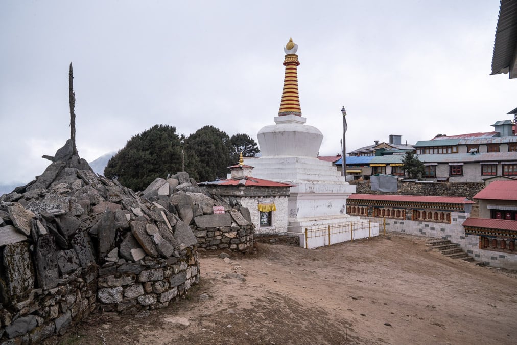 buddhist pagoda and sculptures on a hill in tengboche on the way to everest base camp in nepal