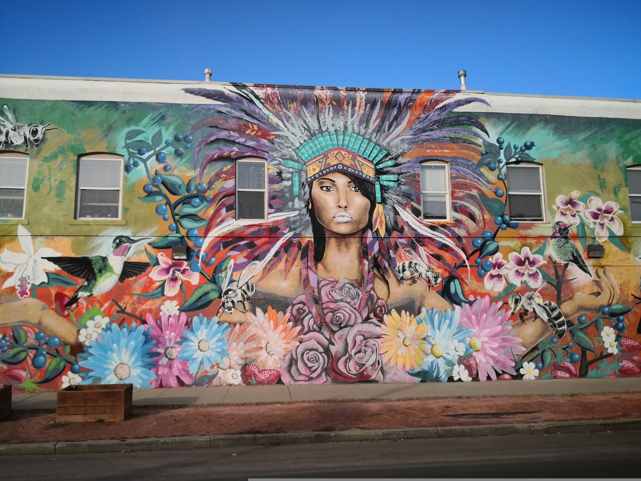 Street art mural on the side of a building in RiNo neighborhood in Denver, Colorado
