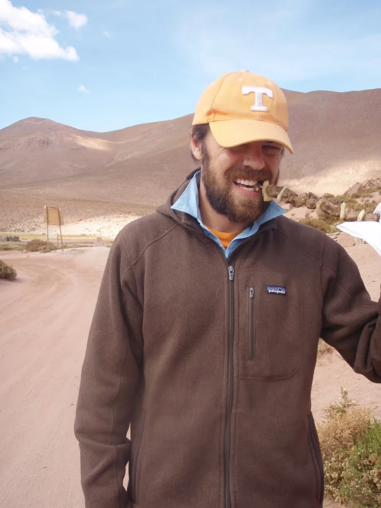 Jeff eating a llama-kabob in the Chilean altiplano. Did not taste like chicken