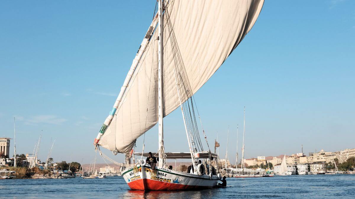a felucca boat sailing through the nile in Egypt
