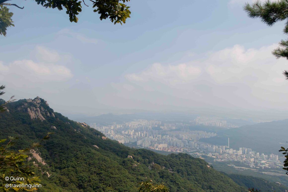 mountain view with the city at the background