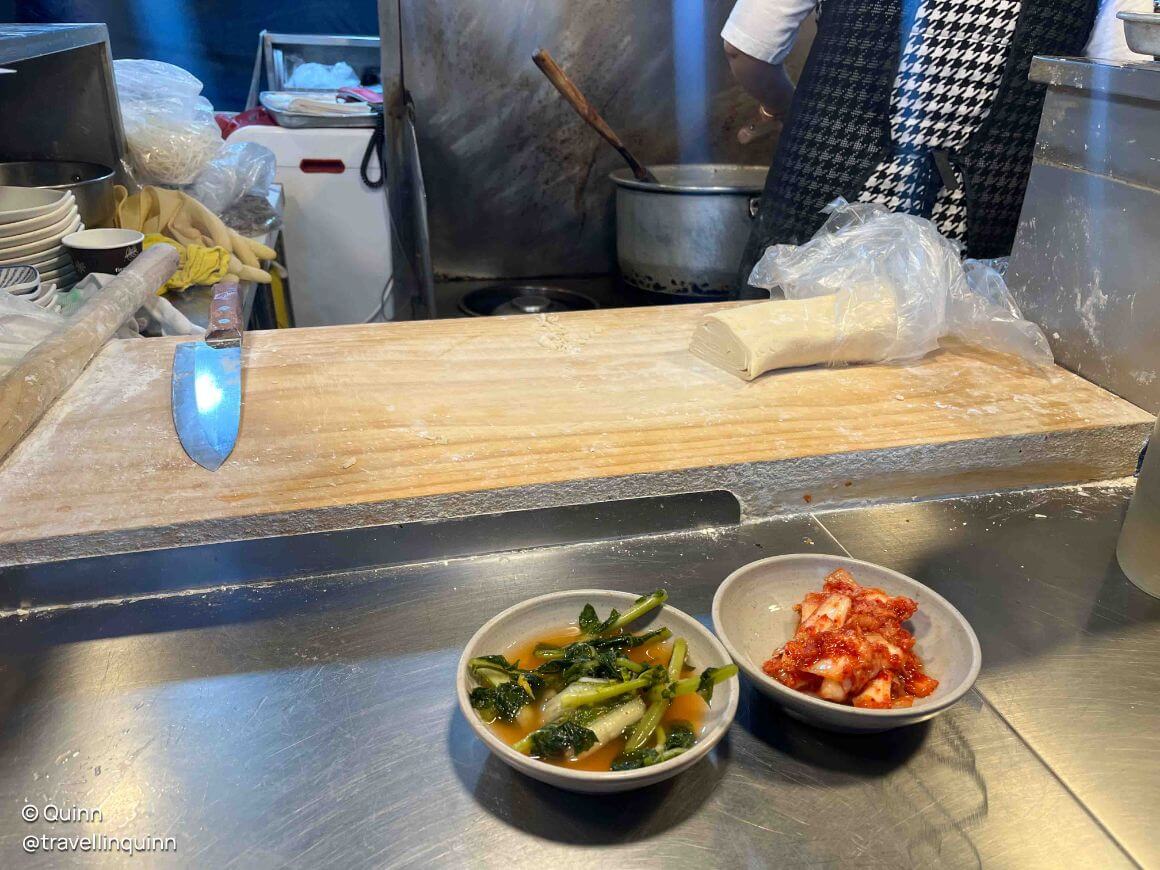 cooking traditional korean noodles
