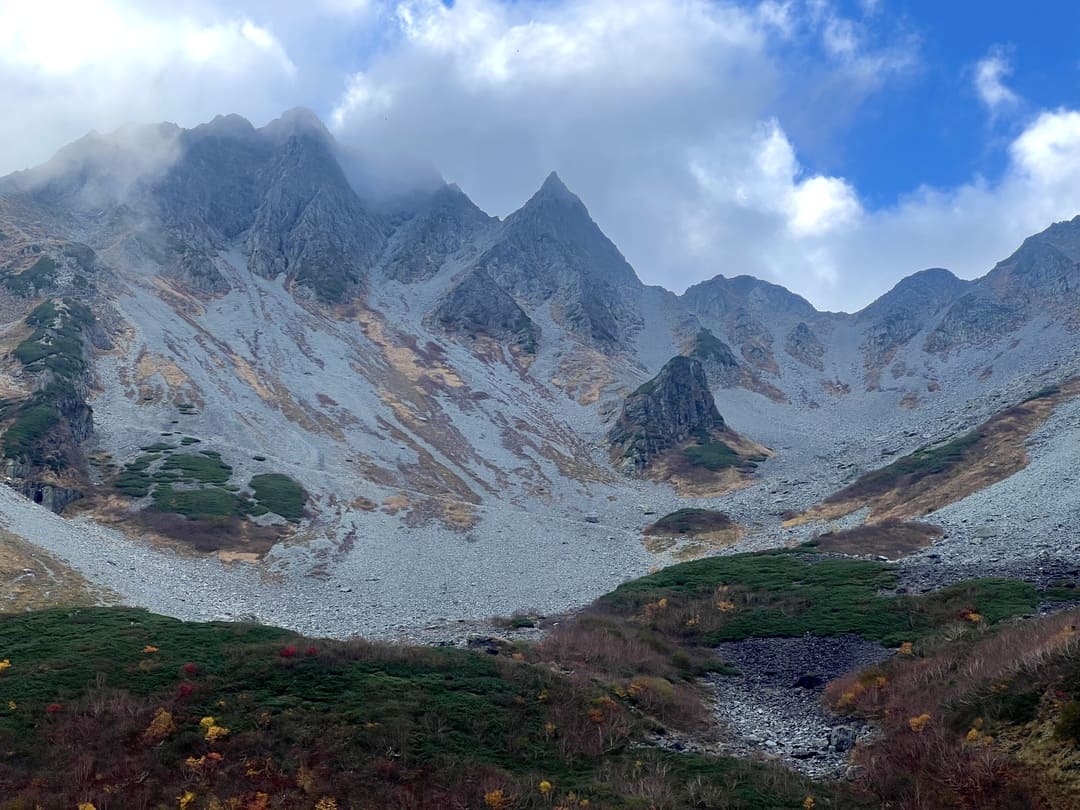 views of jagged mountains at the top of karasawa cirque, kamikochi