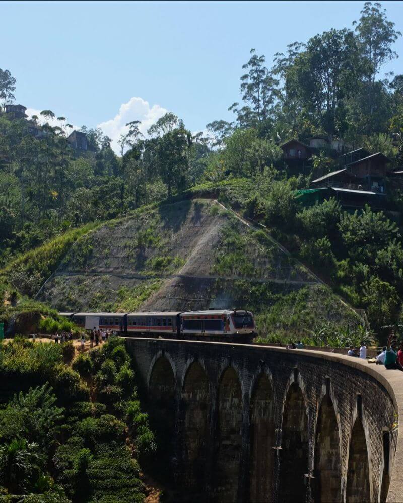 view of train moving on high elevated railway