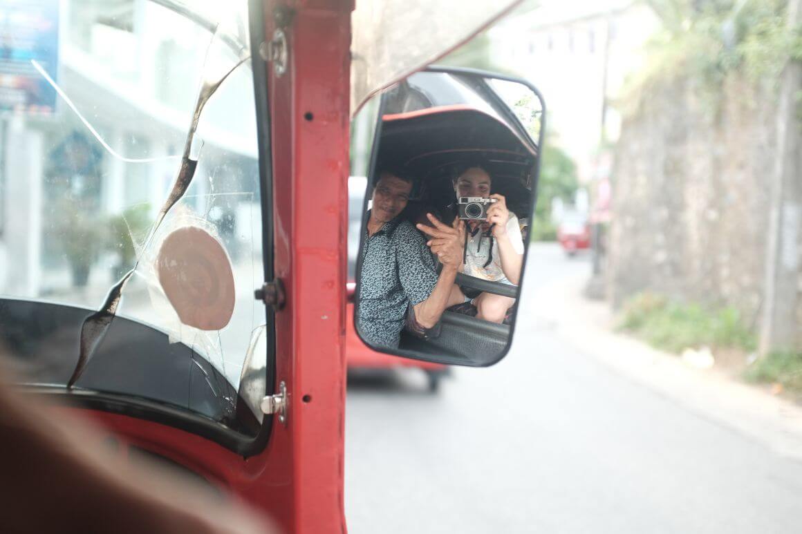 mirror short of traveller and driver on a vehicle