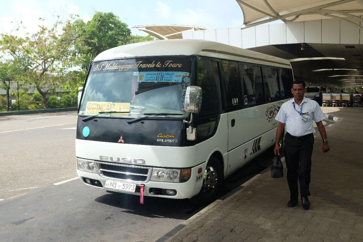parked white van and driver
