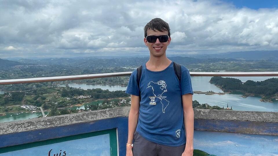 Alex at the top of Guatape's rock in Colombia.