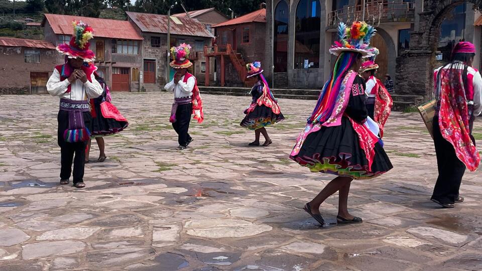 Indigenous performers at Lake Titicaca in Peru.