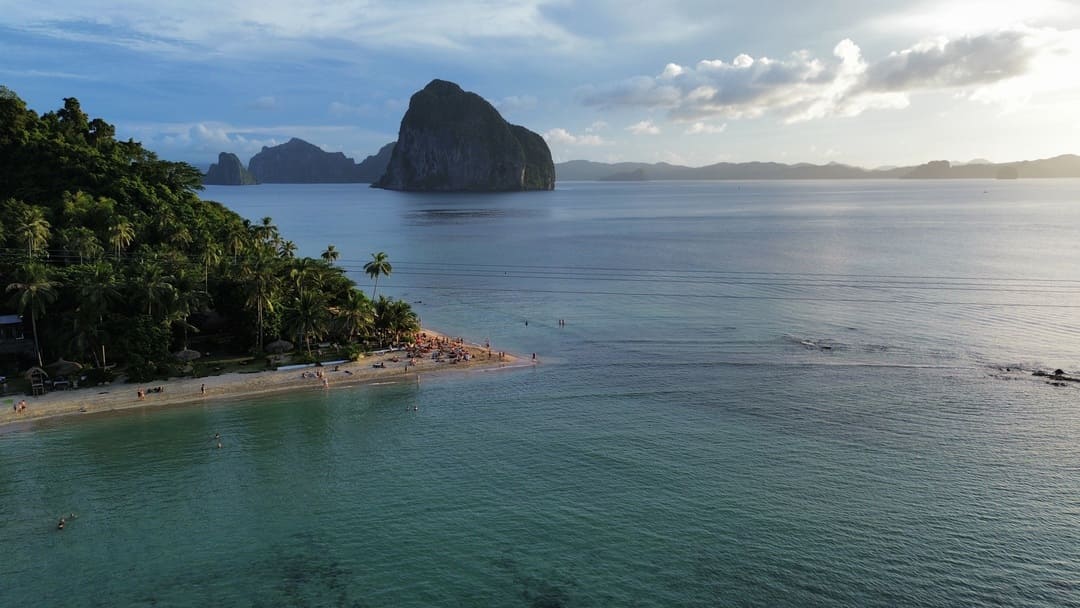 drone shot of las cabanas beach, el nido