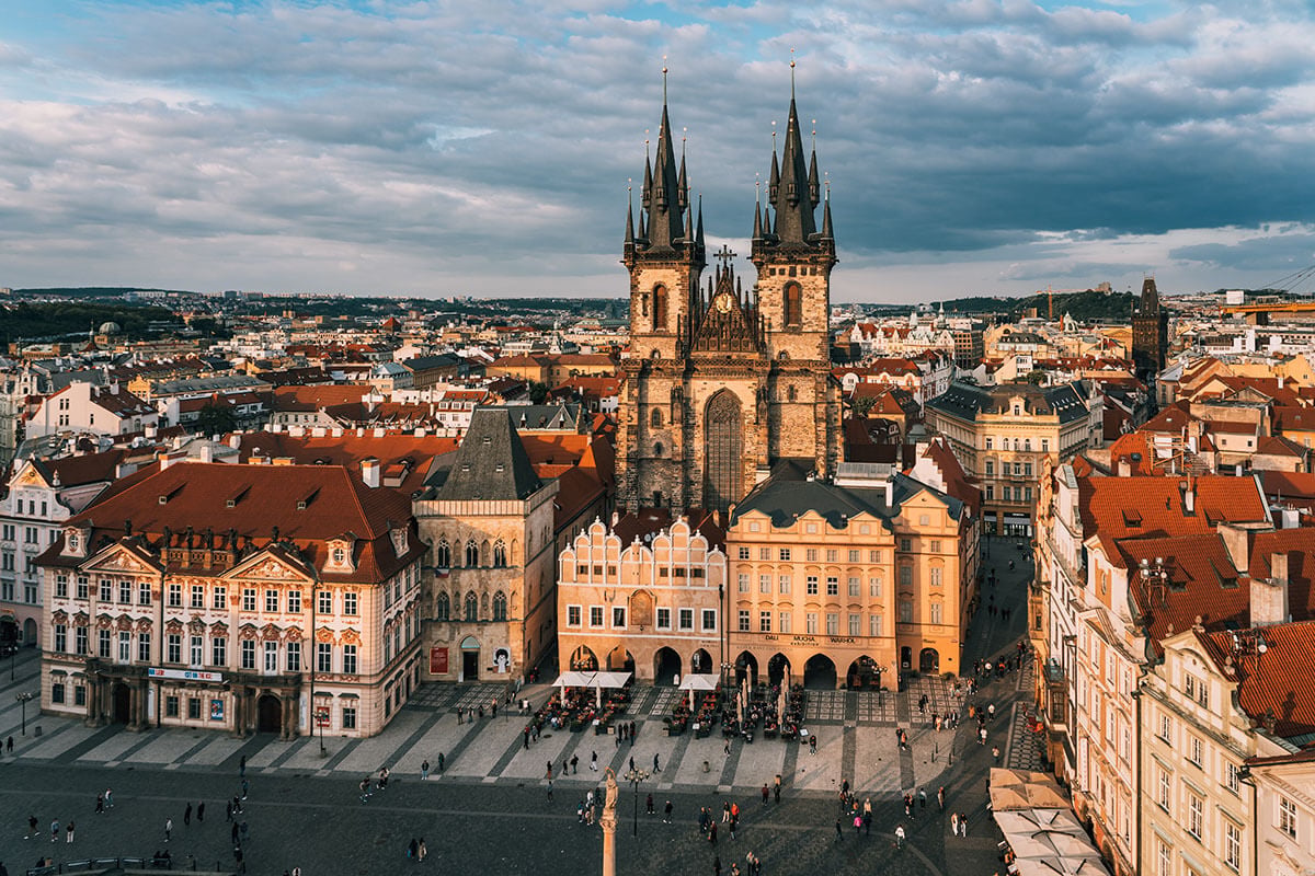 The view over Prague at sunset from the main tower next to the Charles Bridge.