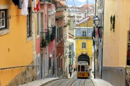 Old trams running up and down in Barrio Alto – Lisbon