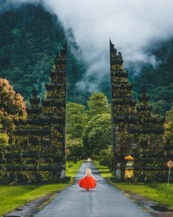 girl at gate in bali