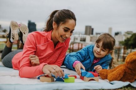 Woman,Playing,With,A,Small,Girl,At,The,Park.,Girl