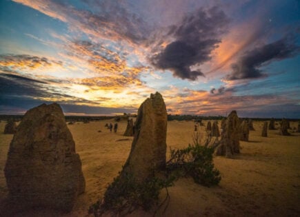 Take in an epic sunset at Pinnacles Desert