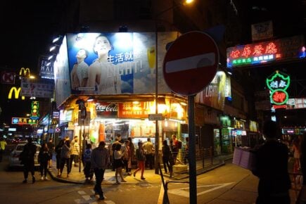 The Tsim Sha Tsui area lit up at night in Hong Kong, China