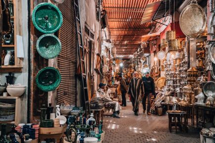 Men wandering through the souks of Marrakech, Morocco.