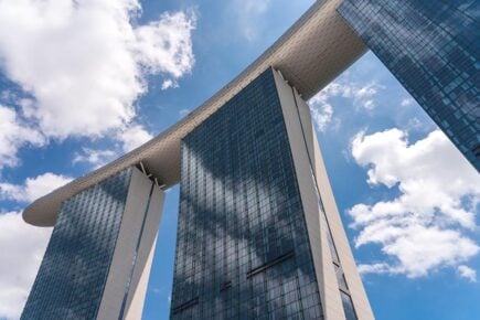 Looking up at the iconic Marina Bay Sands hotel in Singapore