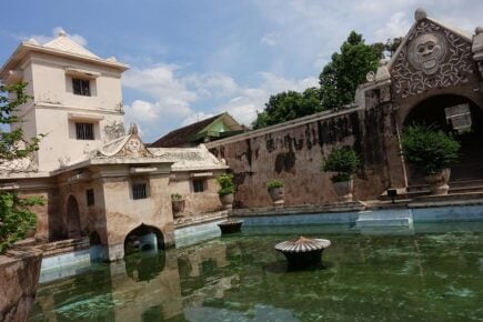 The main pool and entrance way of the water temple in Yogyakarta, Indonesia.