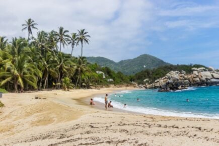 People at the beach in Tayrona Natural National Park in Colombia.